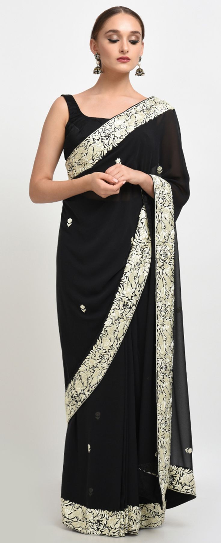 SOLID BLACK VELVET EMBROIDERED SAREE WITH SLEEVELESS BLOUSE â Saad Ibrahim